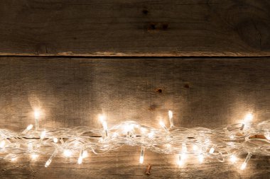 Noel rustik arka plan - vintage ahşap ışıkları ve serbest metin alanı ile dalgalı