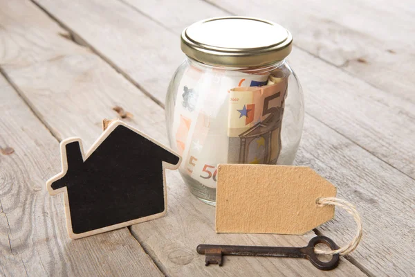 Real Estate Finance Concept Geld Glas Met Vintage Sleutel Huisje — Stockfoto