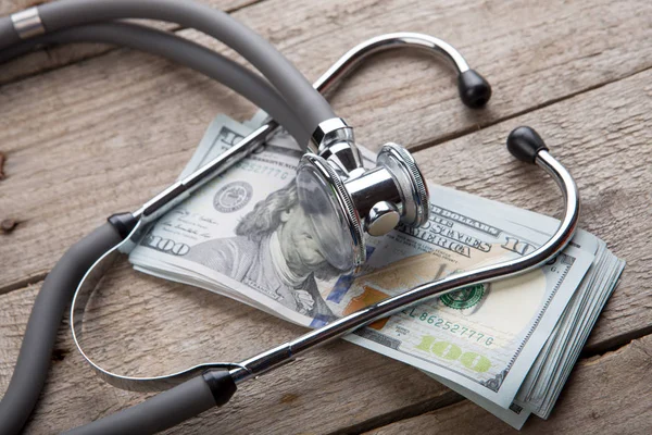 Health Insurance Concept Stethoscope Money Table — Stock Photo, Image