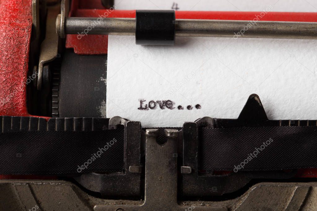 Love - text message on the typewriter close-up