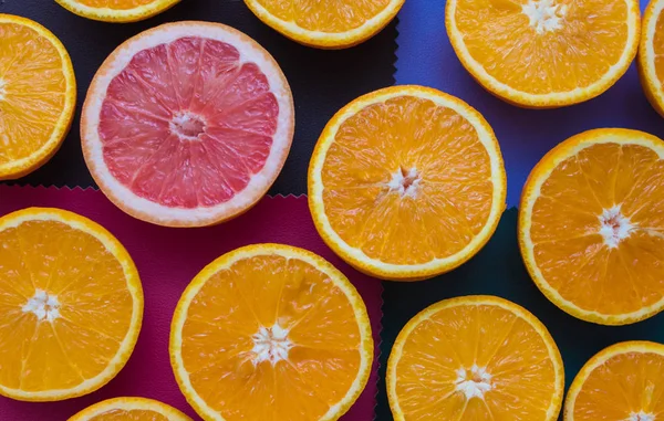 oranges cut into a color texture