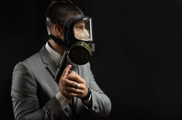 the man in a suit jacket with a gun posing as a special agent