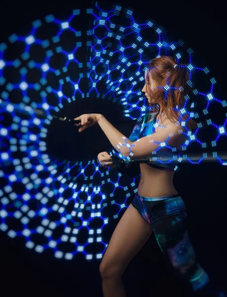 girl dancing light show