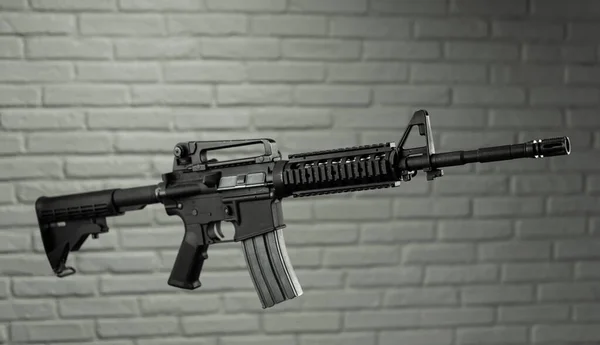 Amerikaans leger geweer M4A1 tegen een stenen muur — Stockfoto