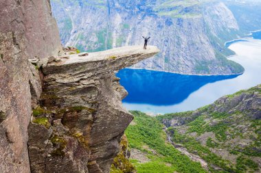 Trolltunga or Troll Tongue is a rock formation  at the Hardangerfjord near Odda town in Hordaland, Norway clipart