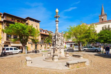 Fountain in Comillas city, Spain clipart