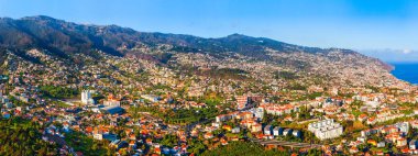 Funchal city aerial panoramic view. Funchal is the capital and largest city of Madeira island in Portugal. clipart