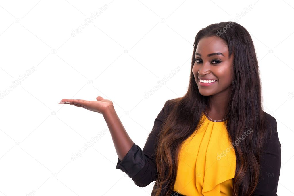 Beautiful african business woman presenting your product, isolated over white