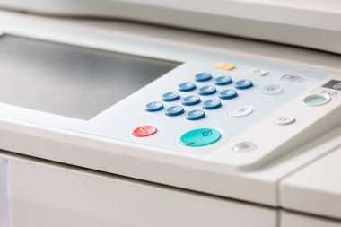 Detail of a modern digital printer of a copy center clipart