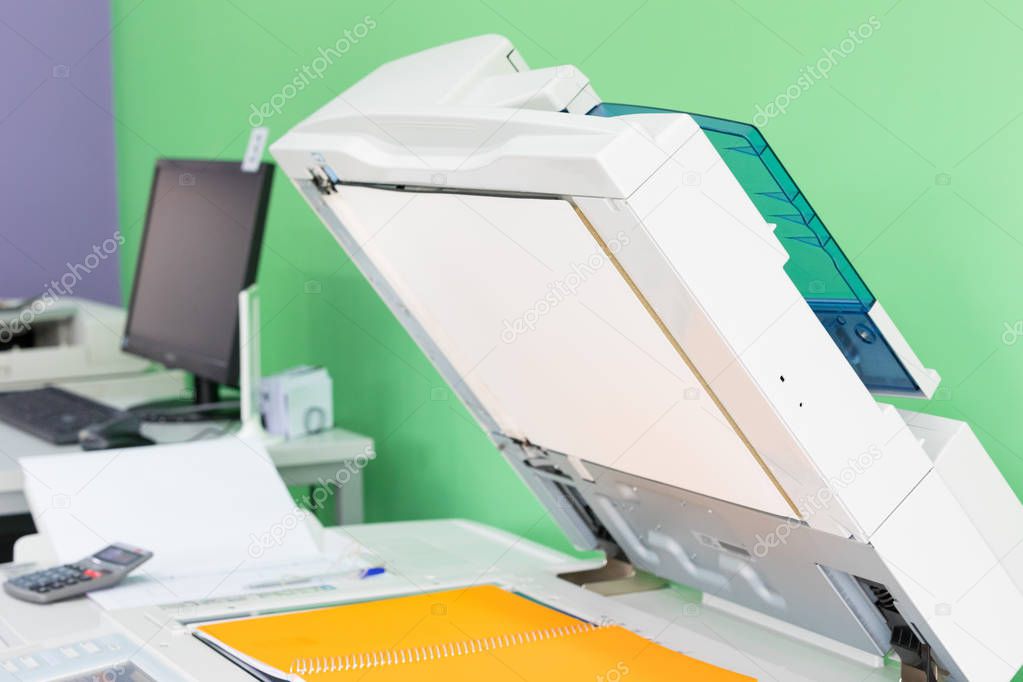 Detail of a modern digital printer of a copy center