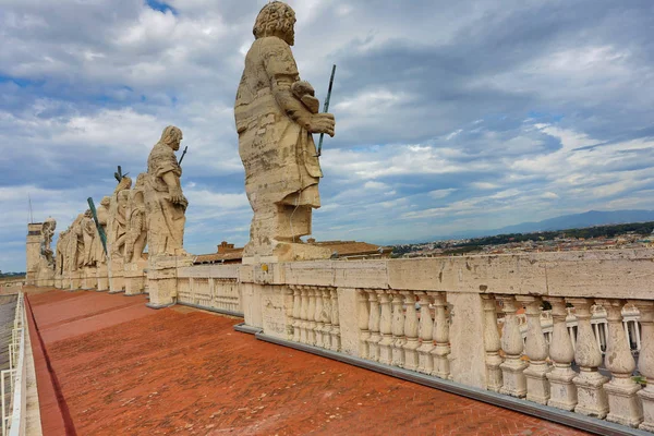 back view of sculptures on roof of Saint Peters Basilica