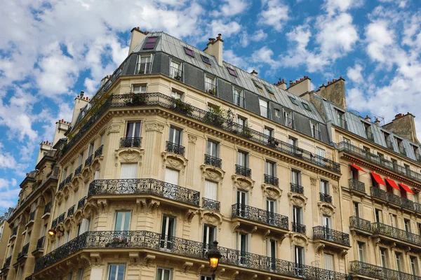 Facade of a traditional living building in Paris, France