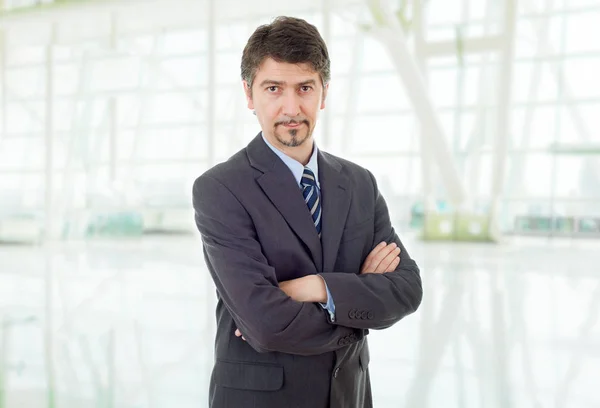 young business man thinking, at the office