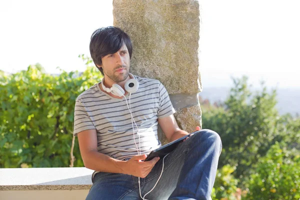 Young Man Working Tablet Listening Music Headphones Outdoor — Stock Photo, Image