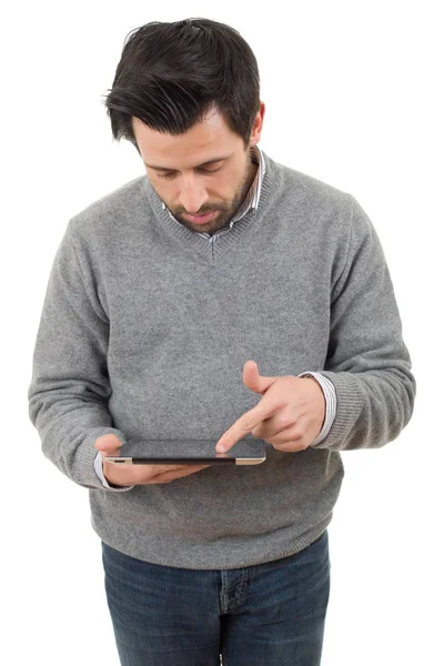 Casual Man Ser Till Sin Tabletpc Isolerade — Stockfoto