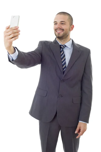商人在西装和领带拍摄自拍照片与手机摄像头 在白色背景下的快乐和成功隔离 — 图库照片
