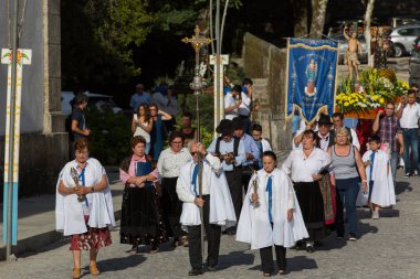 Traditional religious procession of Senhora da Abadia in Amares, Portugal clipart