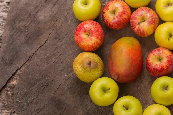 fruits on a old wooden table, studio picture, with copy space. Free space for text