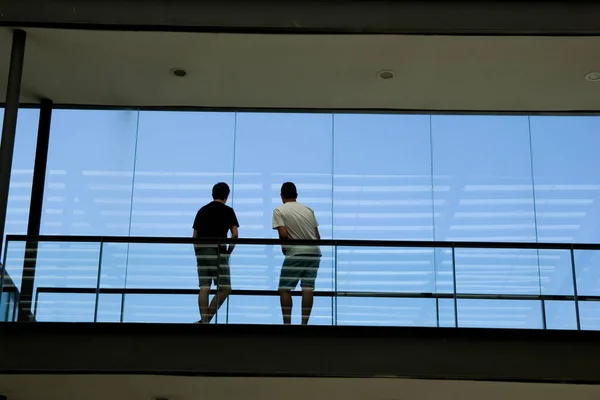 Silhouette View Two Young Men Modern Office Building Interior Panoramic — Stock Photo, Image