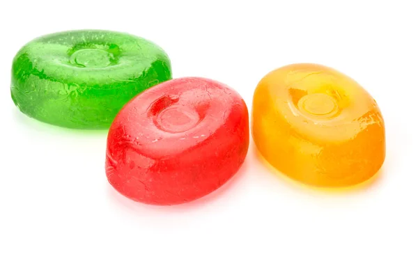 Tre färgglada frukt hårt socker godis, kokt sweeties eller sug — Stockfoto