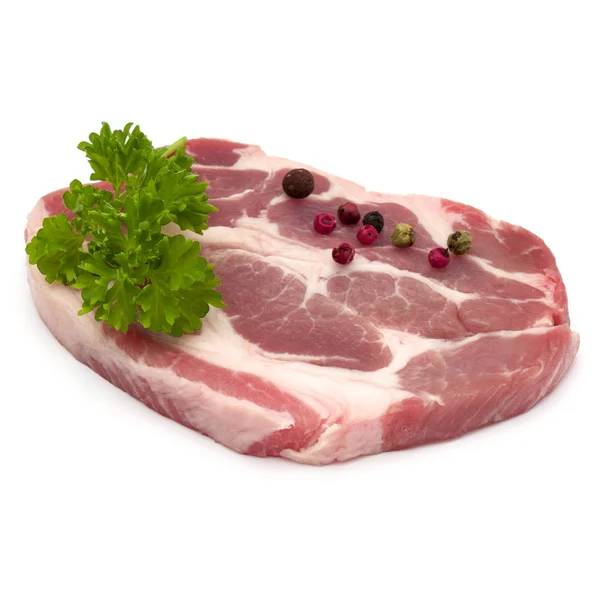 Carne cruda de chuleta de cuello de cerdo con hojas de perejil y pimienta — Foto de Stock