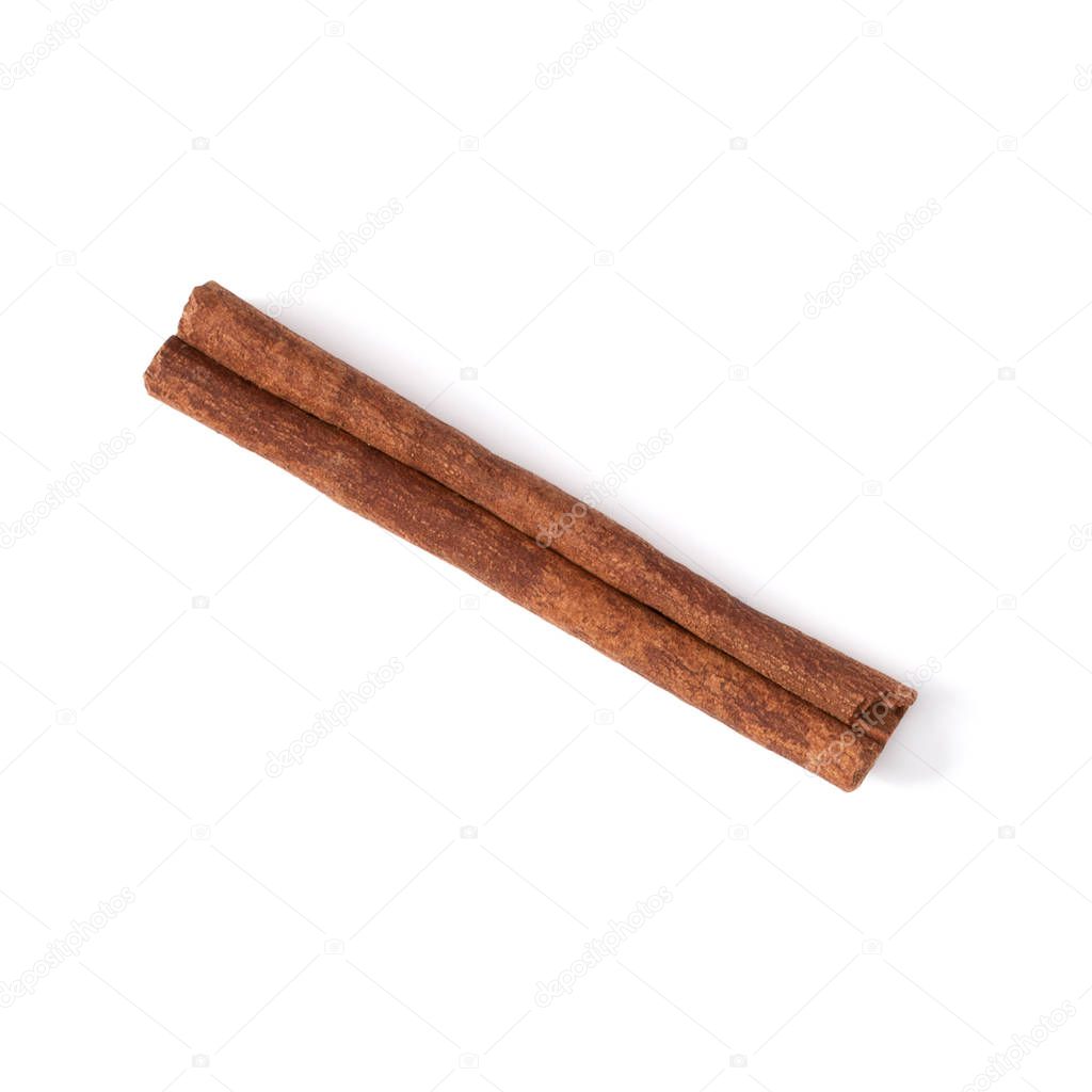 Cinnamon stick isolated on white background closeup. Canella spice. Aromatic condiment background. Flat lay, top view.