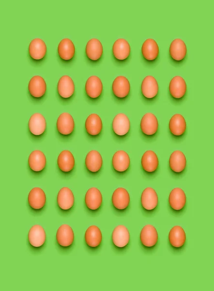 Patrón Huevos Sobre Fondo Verde Concepto Pascua Asiento Plano Vista — Foto de Stock