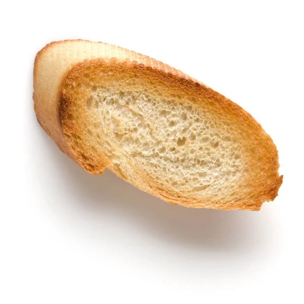 Geroosterd stokbrood slice geïsoleerd op witte achtergrond close-up. T — Stockfoto