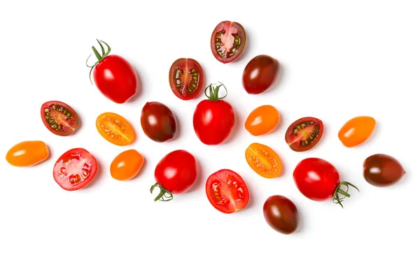 Various colorful tomatoes isolated on white background. Top view — Stock Photo, Image