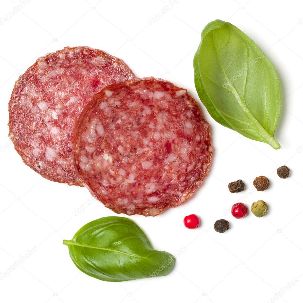 Slices of salami isolated on white background closeup. Sausage a