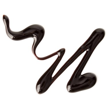 Çikolata şurubu izole üzerinde beyaz arka plan damla. Üstten Görünüm.