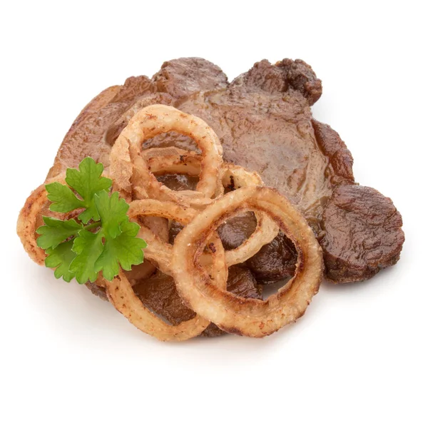 Carne di maiale fritta cotta con foglie di erba prezzemolo e fette di cipolla — Foto Stock