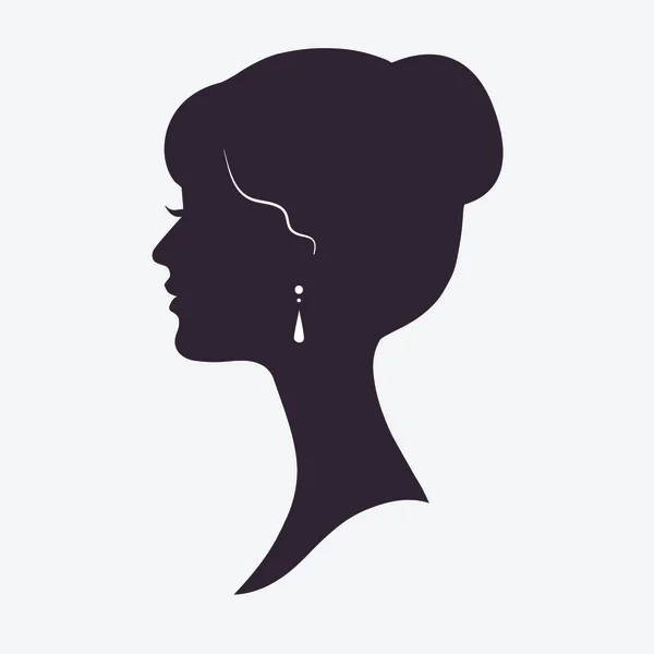 Silueta de cara de mujer con peinado elegante — Vector de stock