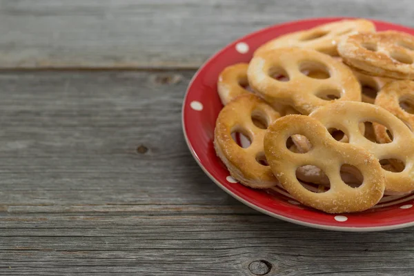 Sweet pretzels on a plate. Rustic style