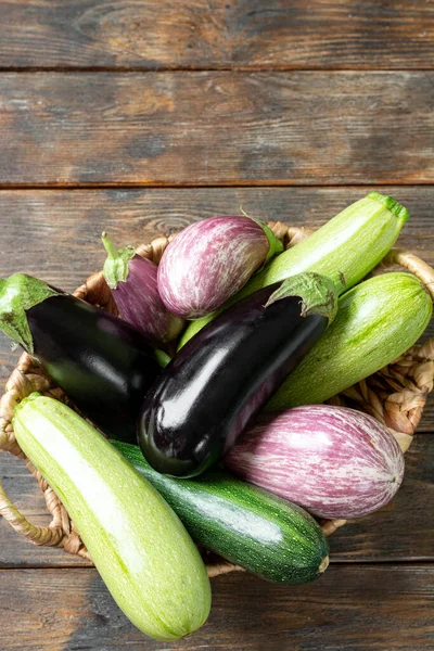 Assortment Vegetables Basket Wooden Table Zucchini Eggplant Basket Table Concept — Stock Photo, Image