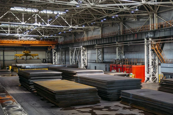 Stacks of steel sheets in warehouse — Stock Photo, Image