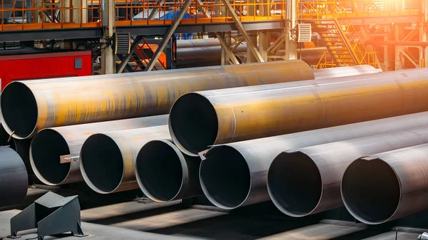 Black steel pipes for water or gas pipeline construction in ware — Stock Photo, Image