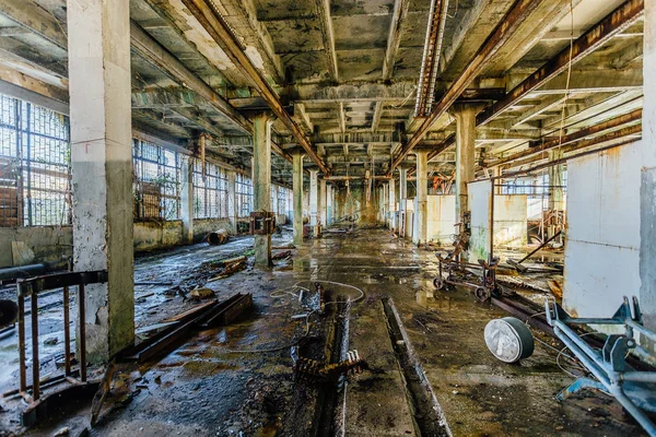 Old abandoned workshop of abandoned submarine torpedo factory