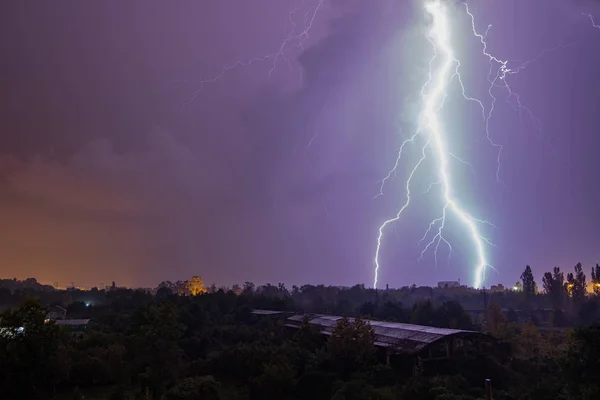 Lightning strikes during thunderstorm over the city