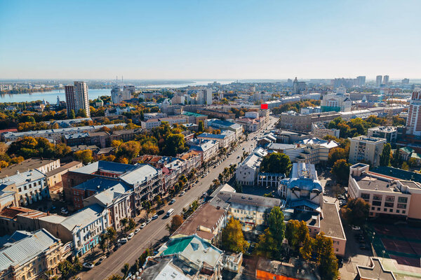 Sunny golden autumn Voronezh. Aerial view from skyscraper roof h