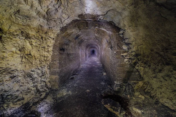 Partially concreted tunnel of constructing mine — Stock Photo, Image