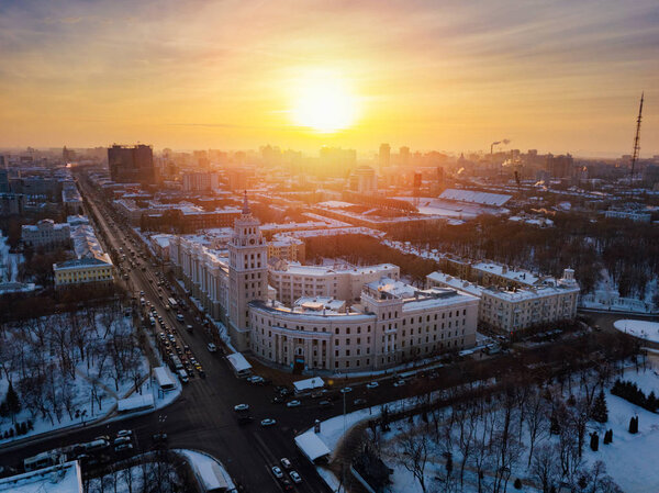 Evening winter Voronezh. Sunset. South-East Railway Administration Building and Revolution prospect. Aerial view from drone.