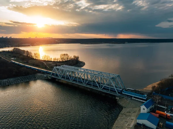 Sunset above railway bridge over Voronezh water reservoir — Stock Photo, Image