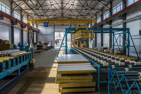 Thermal insulation sandwich panel production line. Machine tools