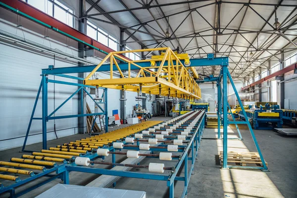 Insulation sandwich panel production line. Machine tools, roller