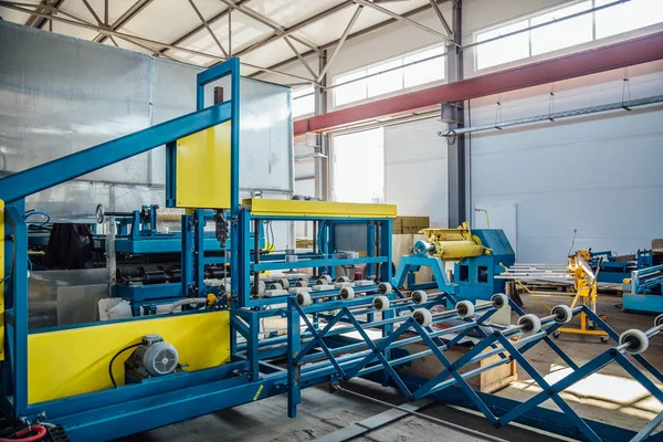 Thermal insulation sandwich panel production line. Roller convey