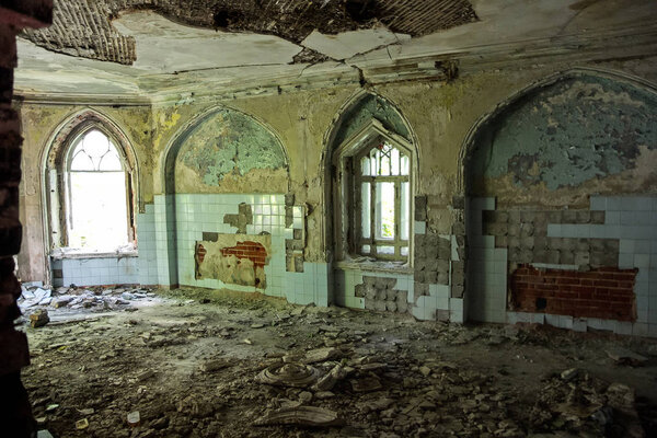 Ruined interior of an abandoned mansion of Khvostov in gothic st