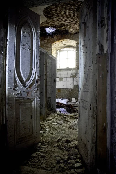 Old rotten door of an abandoned homestead Khvostov, Lipetsk regi