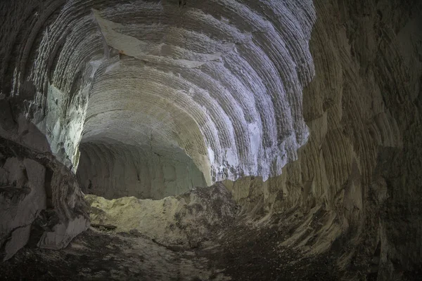 Chalk mine tunnel with traces of drilling machine — Stock Photo, Image