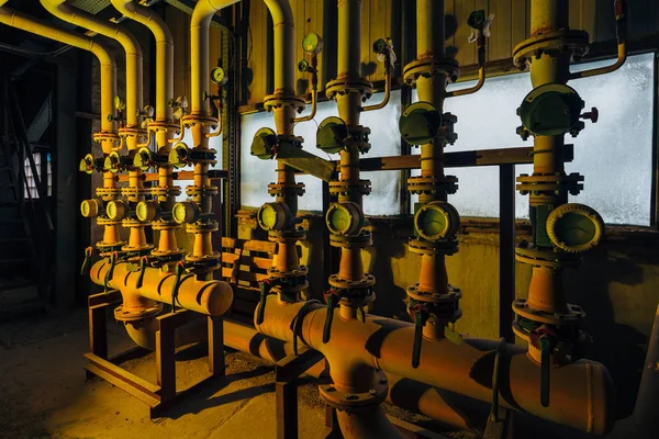 Steel industrial pipeline with valves and manometers